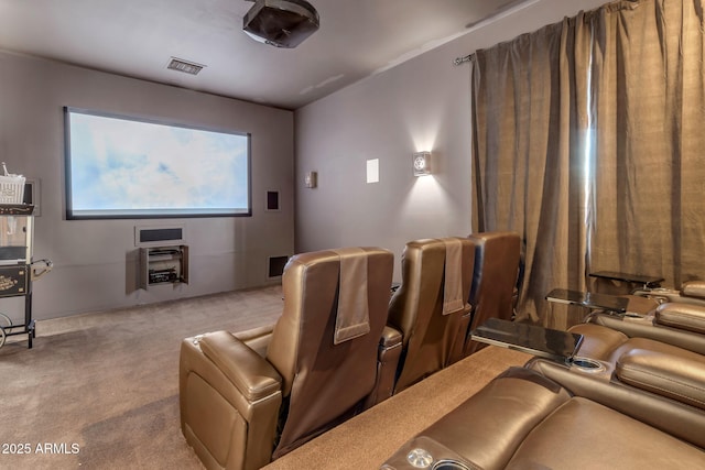 home theater room featuring light carpet