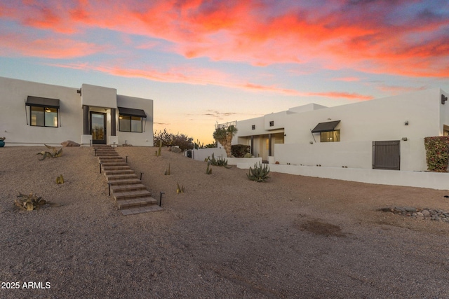 view of pueblo revival-style home