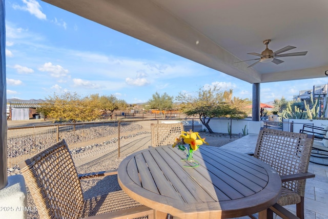 exterior space featuring a patio area and ceiling fan