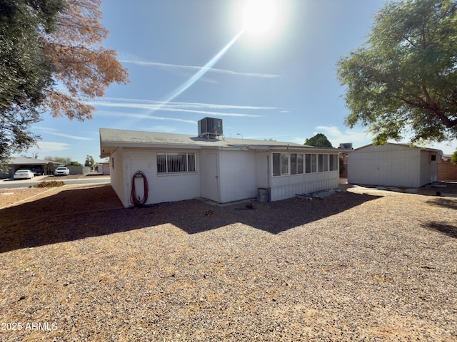 back of property with cooling unit