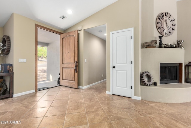 entrance foyer with lofted ceiling