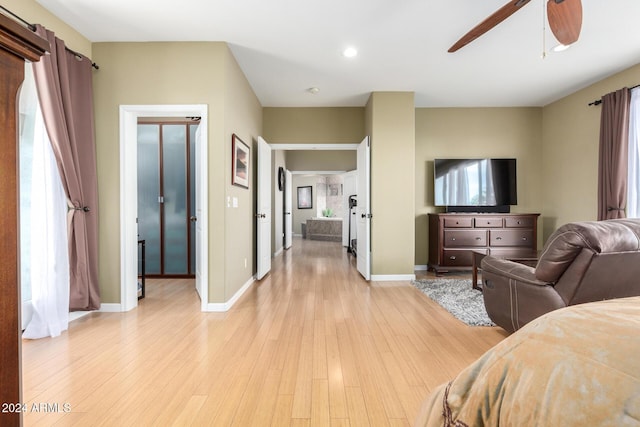 bedroom featuring ceiling fan and light wood-type flooring