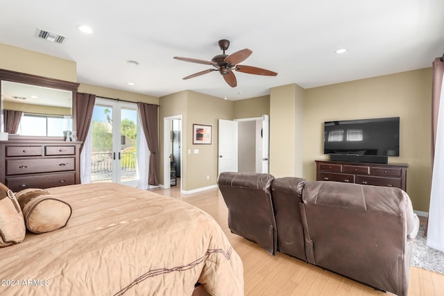 bedroom with ceiling fan, light hardwood / wood-style floors, access to outside, and french doors