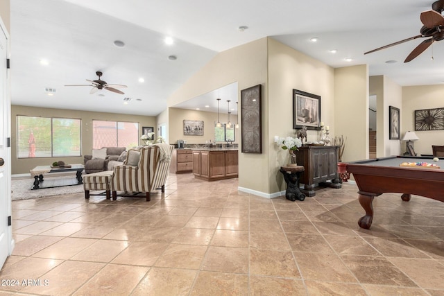 living room featuring ceiling fan, lofted ceiling, and pool table