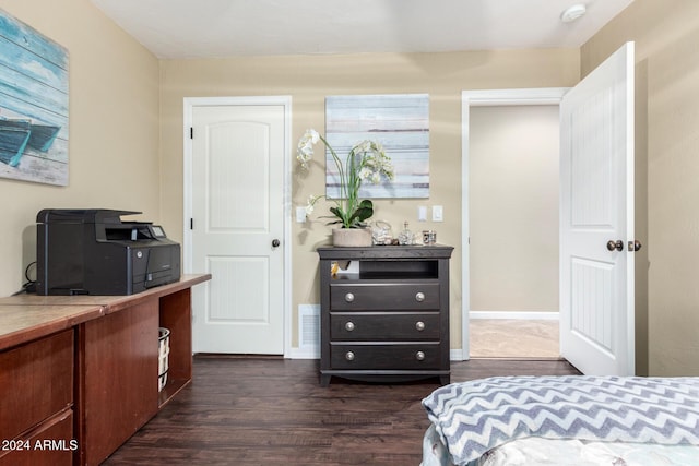 bedroom featuring dark hardwood / wood-style floors