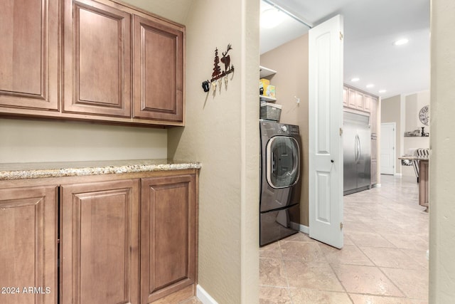 laundry area with washer / dryer