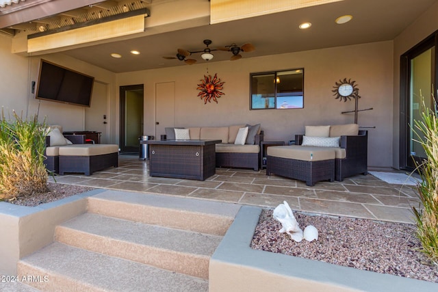 view of patio with outdoor lounge area and ceiling fan