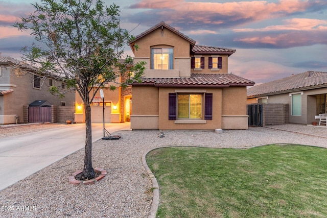 2986 E Country Shadows St, Gilbert, AZ 85298 - mediterranean / spanish-style home featuring stucco siding, a tiled roof, and concrete driveway