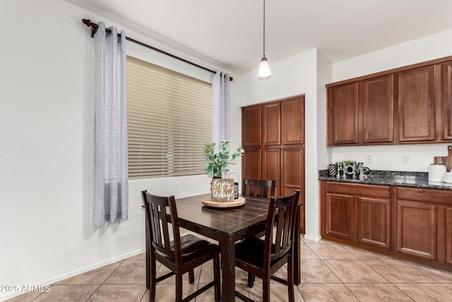 2986 E Country Shadows St, Gilbert, AZ 85298 - dining space with light tile patterned flooring and baseboards