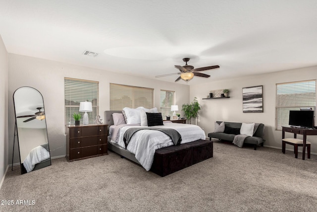 2986 E Country Shadows St, Gilbert, AZ 85298 - carpeted bedroom featuring multiple windows, baseboards, and ceiling fan