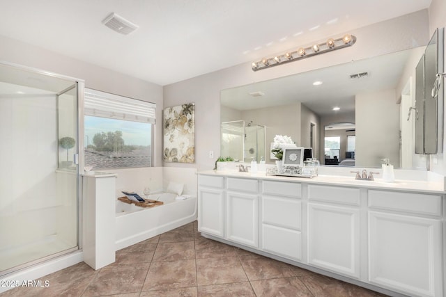 2986 E Country Shadows St, Gilbert, AZ 85298 - full bathroom with a stall shower, a garden tub, double vanity, tile patterned flooring, and ensuite bathroom