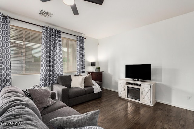 2986 E Country Shadows St, Gilbert, AZ 85298 - living room featuring a ceiling fan, wood-type flooring, and baseboards