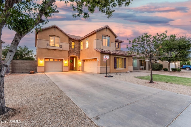 2986 E Country Shadows St, Gilbert, AZ 85298 - mediterranean / spanish home featuring a tiled roof, stucco siding, an attached garage, and concrete driveway