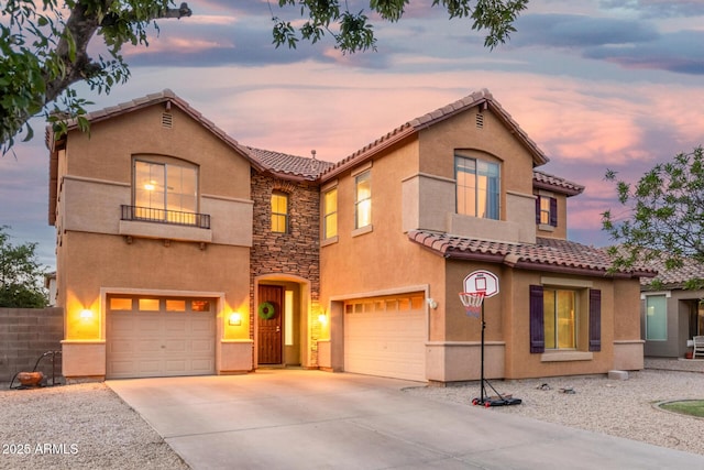 2986 E Country Shadows St, Gilbert, AZ 85298 - mediterranean / spanish home with a tile roof, a garage, stucco siding, driveway, and stone siding