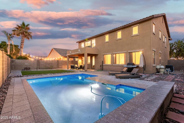2986 E Country Shadows St, Gilbert, AZ 85298 - pool at dusk with a fenced backyard and a patio