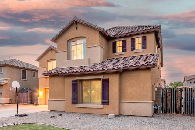 2986 E Country Shadows St, Gilbert, AZ 85298 - back of house featuring a tile roof and stucco siding