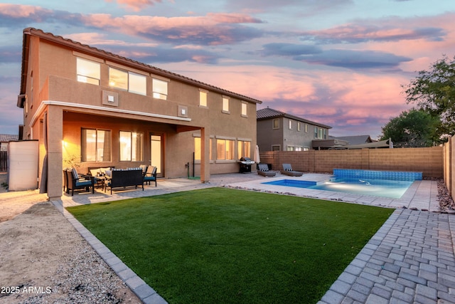 2986 E Country Shadows St, Gilbert, AZ 85298 - rear view of property featuring outdoor lounge area, stucco siding, and a patio area