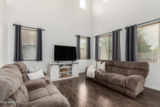 2986 E Country Shadows St, Gilbert, AZ 85298 - living room with a high ceiling, baseboards, and dark wood-type flooring
