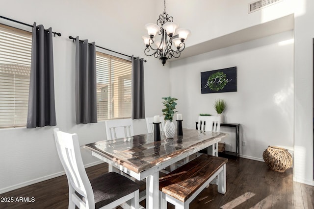 2986 E Country Shadows St, Gilbert, AZ 85298 - dining area with a chandelier, dark wood-style floors, and baseboards