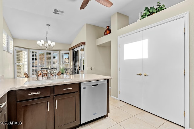 kitchen with dishwasher, hanging light fixtures, vaulted ceiling, ceiling fan with notable chandelier, and sink