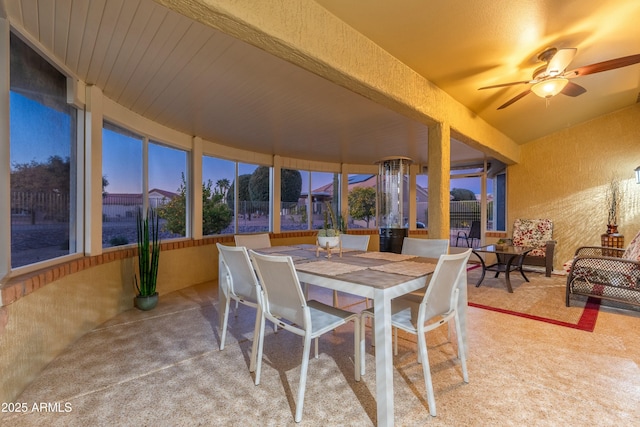 dining room featuring ceiling fan