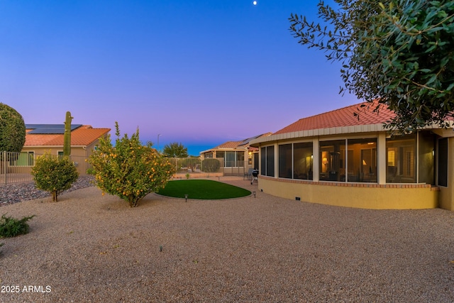 yard at dusk with a patio