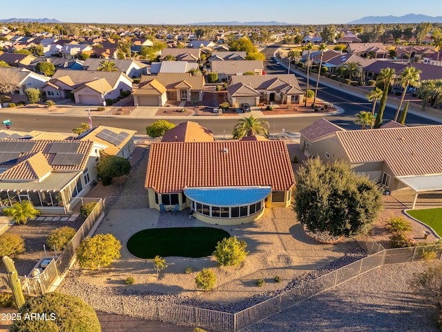 birds eye view of property featuring a mountain view