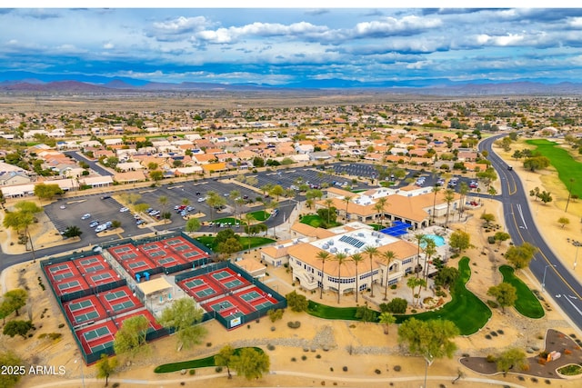 birds eye view of property featuring a mountain view