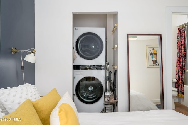 1225 E Medlock Dr Unit 206, Phoenix, AZ 85014 - washroom featuring estacked washer and dryer