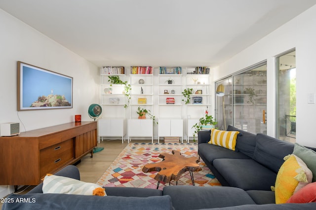 1225 E Medlock Dr Unit 206, Phoenix, AZ 85014 - living room with light wood-style floors