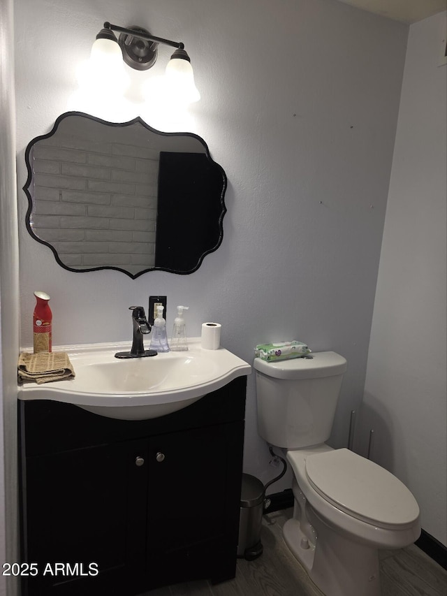 half bath with toilet and vanity