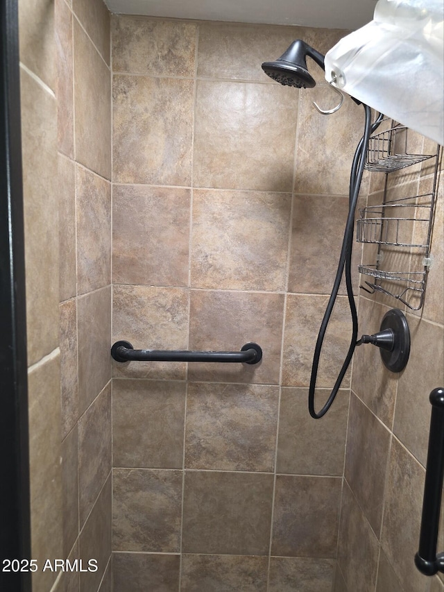 details featuring a tile shower