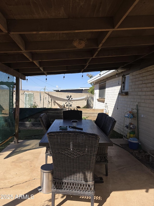 view of patio with outdoor dining area