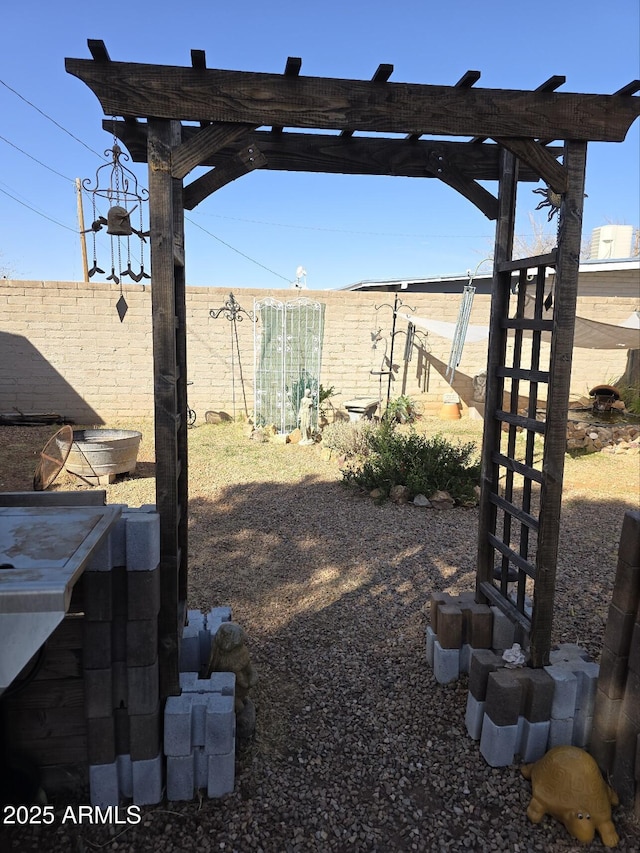 view of yard with fence