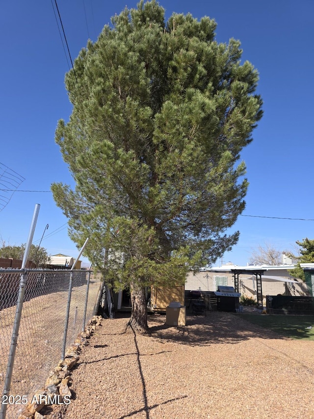 exterior space featuring fence