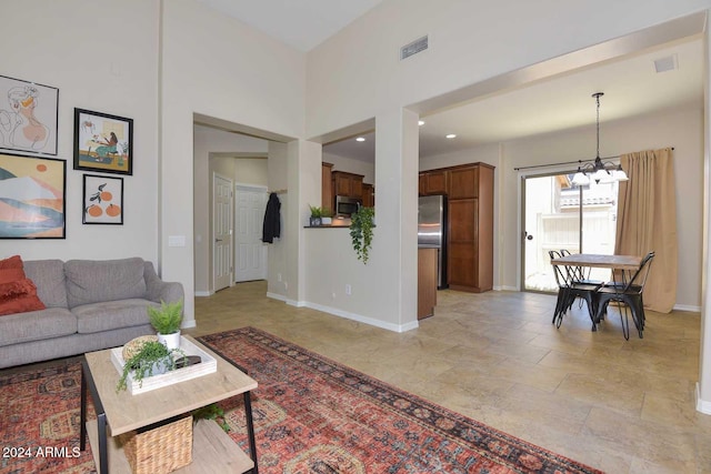 living room featuring a chandelier