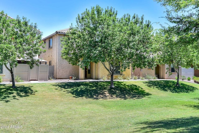 view of front of property with a front lawn