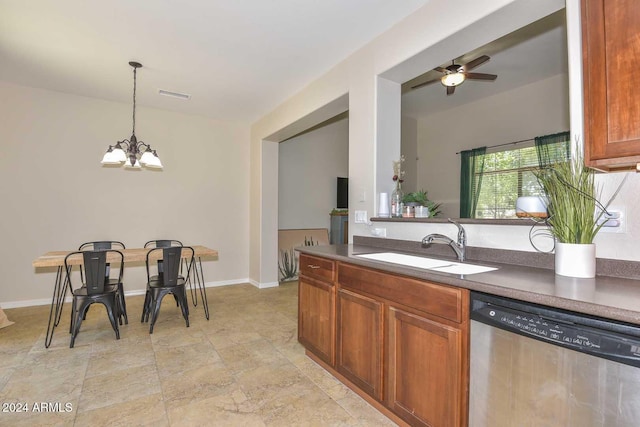 kitchen featuring ceiling fan with notable chandelier, dishwasher, sink, and hanging light fixtures