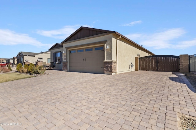 view of side of home with a garage