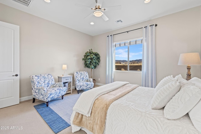 bedroom with light colored carpet and ceiling fan