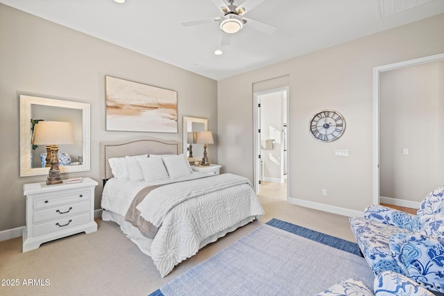 carpeted bedroom featuring ceiling fan and connected bathroom