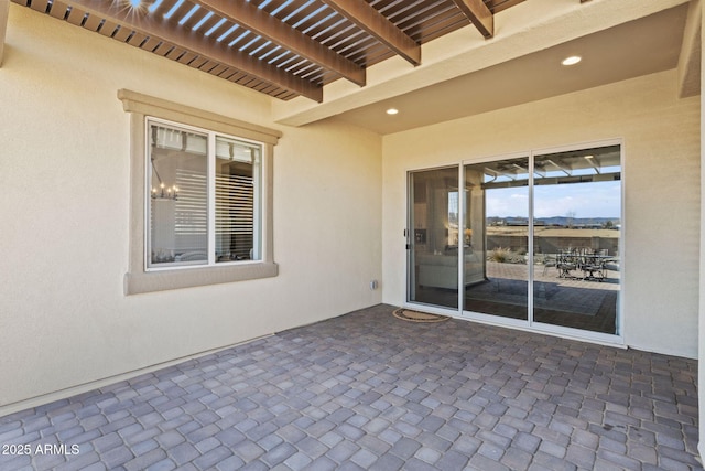 view of patio featuring a pergola