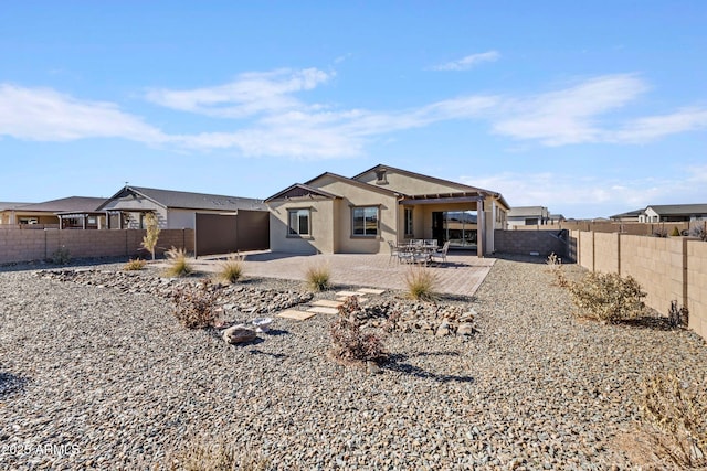 view of front of home with a patio