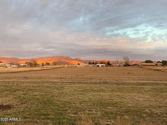 view of mountain feature with a rural view