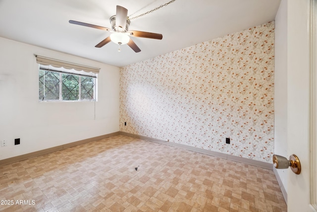 spare room featuring ceiling fan