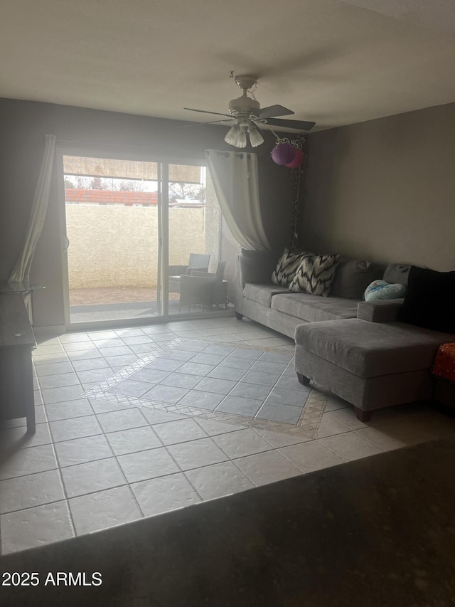 living room with light tile patterned floors and ceiling fan