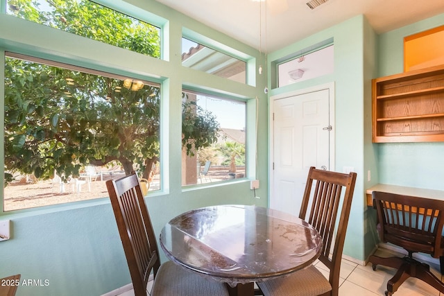 sunroom featuring visible vents