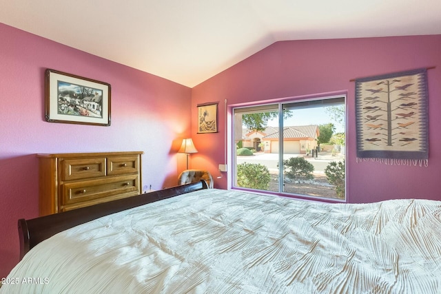 bedroom featuring vaulted ceiling