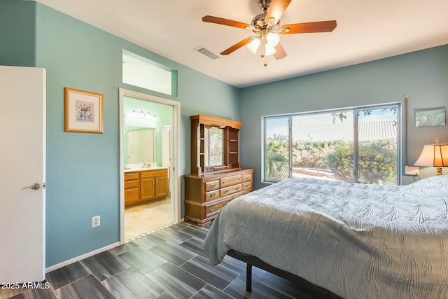 bedroom featuring ensuite bathroom, ceiling fan, and visible vents