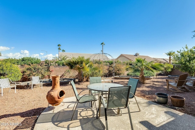 view of patio with outdoor dining space